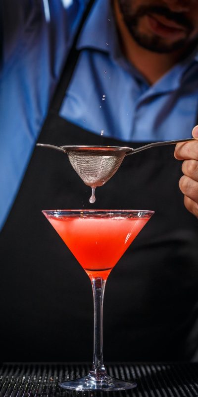 barman-makes-cosmopolitan-cocktail.jpg